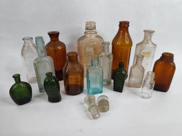 Various medical and elixir bottles