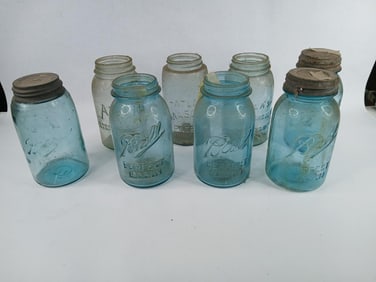 8 blue jars with a few zinc lids