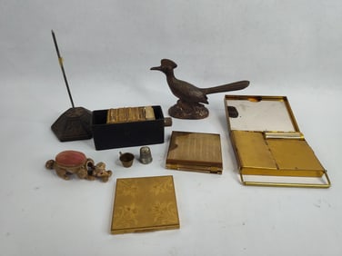 1930th sales tax stamps w/ holder ,cast iron receipt holder ,cast iron poodle pin cushion and more