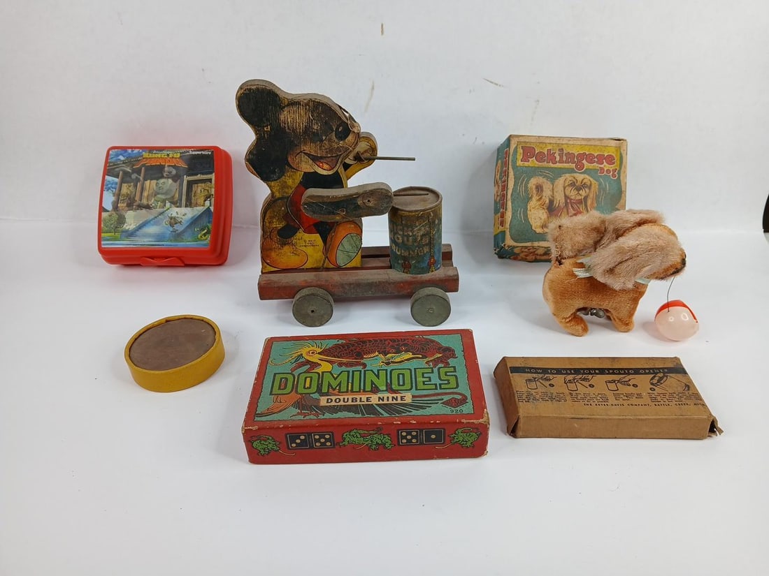 Mickey mouse drummer pull toy ,pekingese mechanical dog and more: see photos for full lot