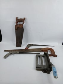 4 hand saws and Putter Kutter