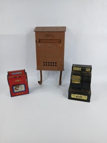 Brown bungalow style mail drop box,tin mailbox coin bank and uncle sam's 3 coin register bank