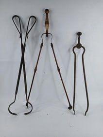 Brass and cast fireplace tools