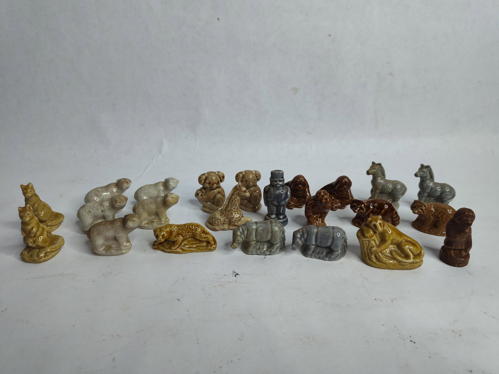 23 Wade Whimsies porcelain figures: .