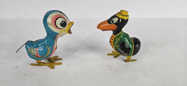 Tin litho wind up hopping birds toys