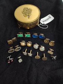 Cufflinks in vintage jewelry box
