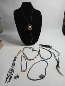 Scorpion bolo tie,eagle tooth pendant,shell necklace ,glass arrow head and more