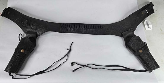 Black leather cartridge belt with dual pistol holsters