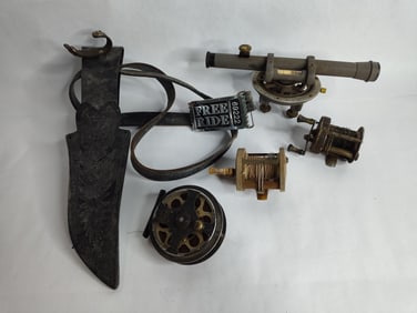 Old fishing reels ,leather belt with knife sheath and transit scope