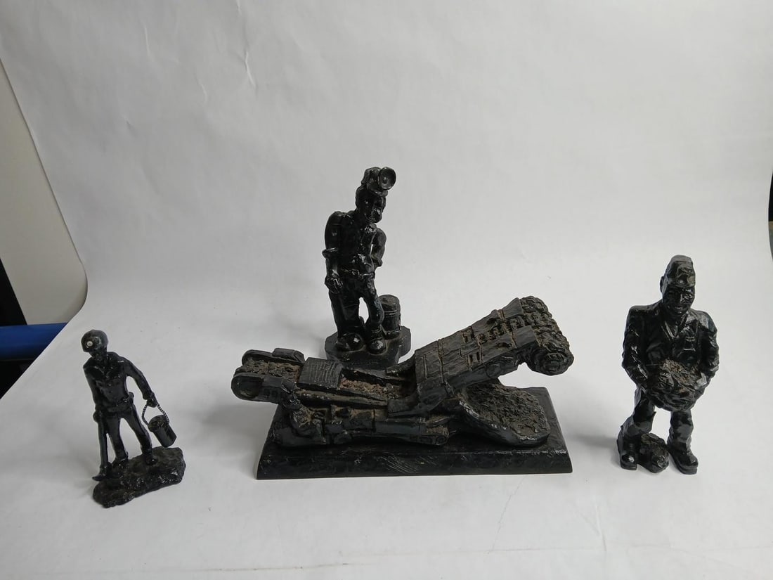 Hand carved coal miners and machine from coal (1 of 16)