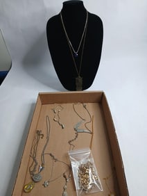 12 gold and silver tone necklaces