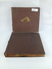2 victrola records albums containing 22 records