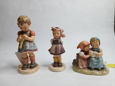 3 Goebel hummels stitch in time ,witch hand and easter time