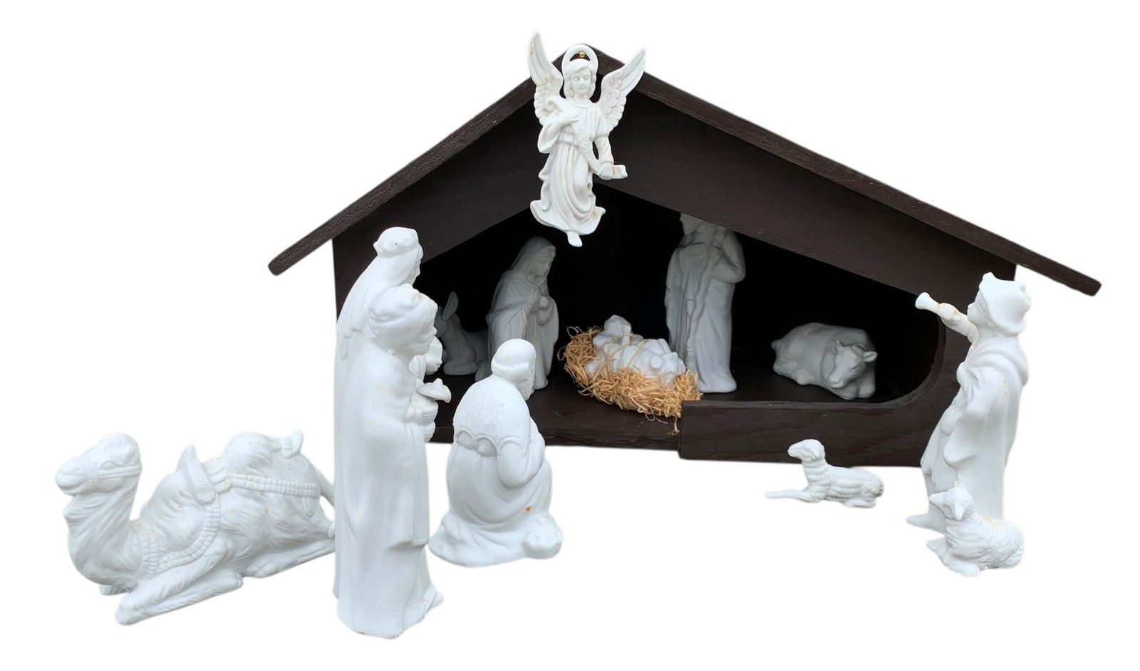 Vintage Handmade Wood Christmas Nativity with Bisque Figurines: Handcrafted vintage wooden stable with hole in the rear for a light (Not included), white bisque figurines with damage to Mary's hand, Baby Jesus is missing a arm and the donkey has a ear that needs g