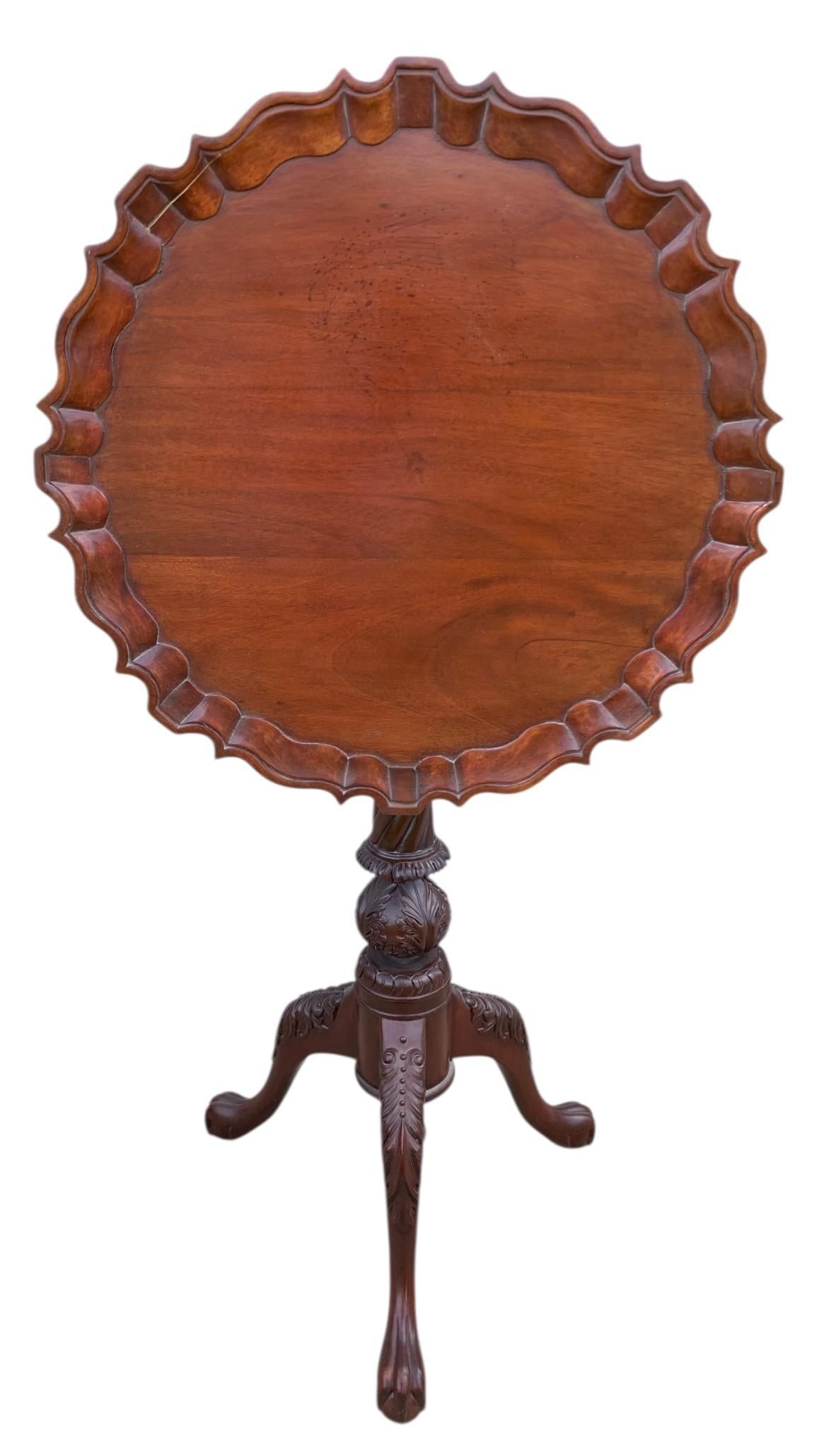 Ornate Carved Wood Tilt Top Piecrust Edge 3 Footed Tea Table: Wooden pin to remove the top completely from the base and another to tilt the table top, 27" height of table top when horizontal, 20" width, 38" total height when upright, structurally sound with thin