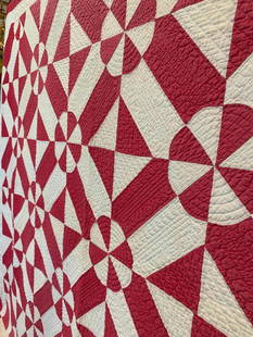 Heirloom Antique Hand Stitched Ruby and White Circular Bowtie Variation Geometric Quilt, Coverlet: Tiny hand stitches in ruby red and white, 80" x 67", some shade variations and storage soiling, the fabric remains sound, WCB hand inked along a underside edge.