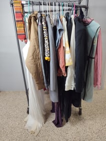 Rack of Designer, Ceremonial and Vintage High end clothing