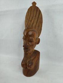 Hand carved wooden sculpture of African Woman showcasing intricate head dress