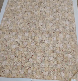 Floral and Cream color patchwork quilt w/ ribbing