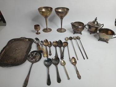 Large lot of Silver Plated Serving and flat ware inc. goblets, creamer, sugar and more