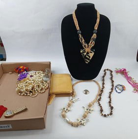 Assorted lot of jewelry, beads, pearls, bible and more