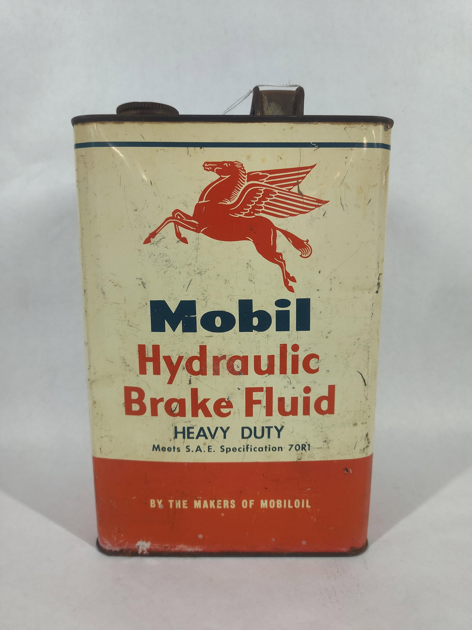 Mobiloil Hydraulic Brake Fluid: One gallon can with several minor dents and scuffs