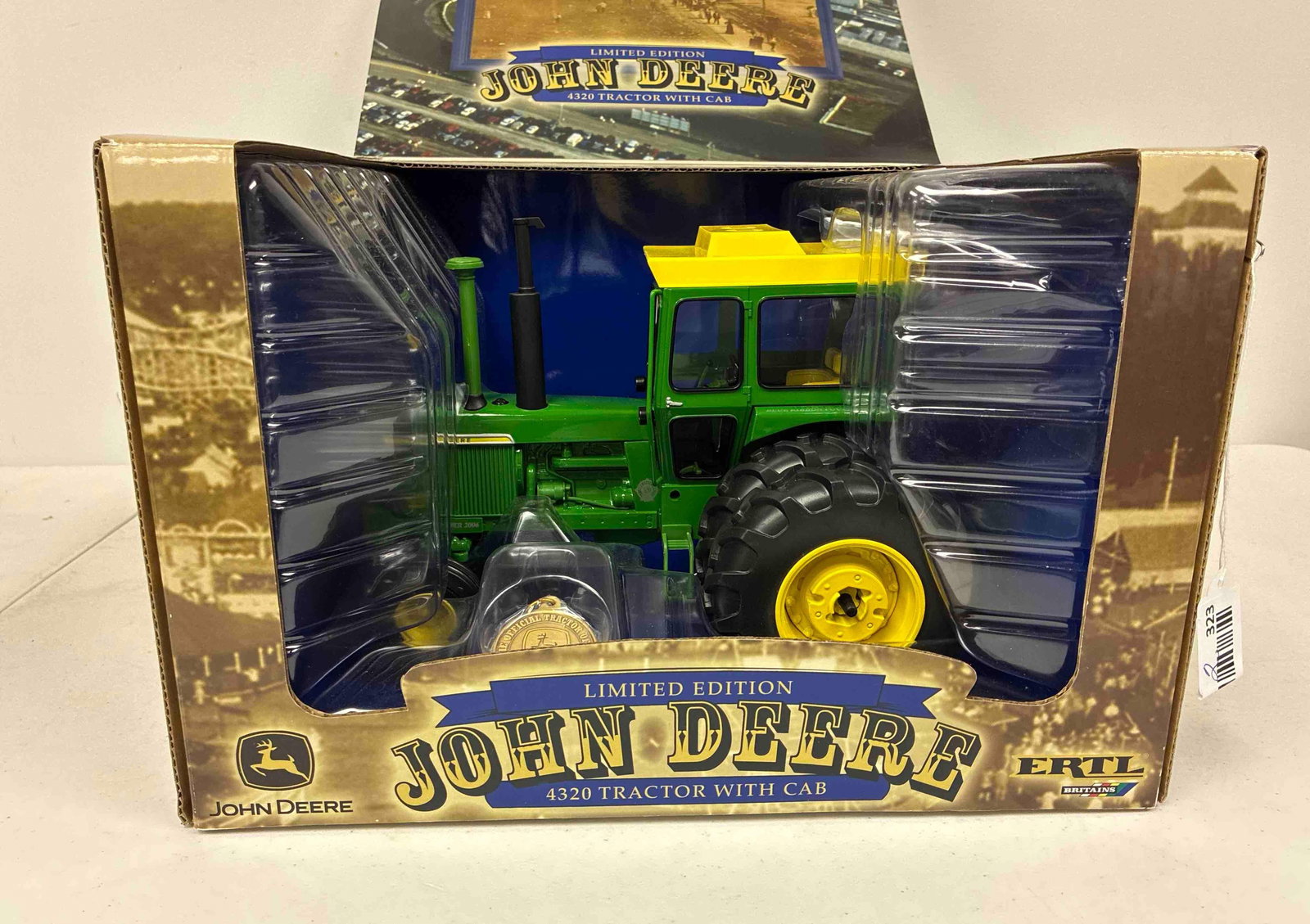 Ertl John Deere Limited Edition 4320 Tractor w/ Cab 4th in a Series Iowa State Fair Blue Ribbon: Serialized 1523/3500 Stock no. 16142A-1HC? 1/16 scale? ?