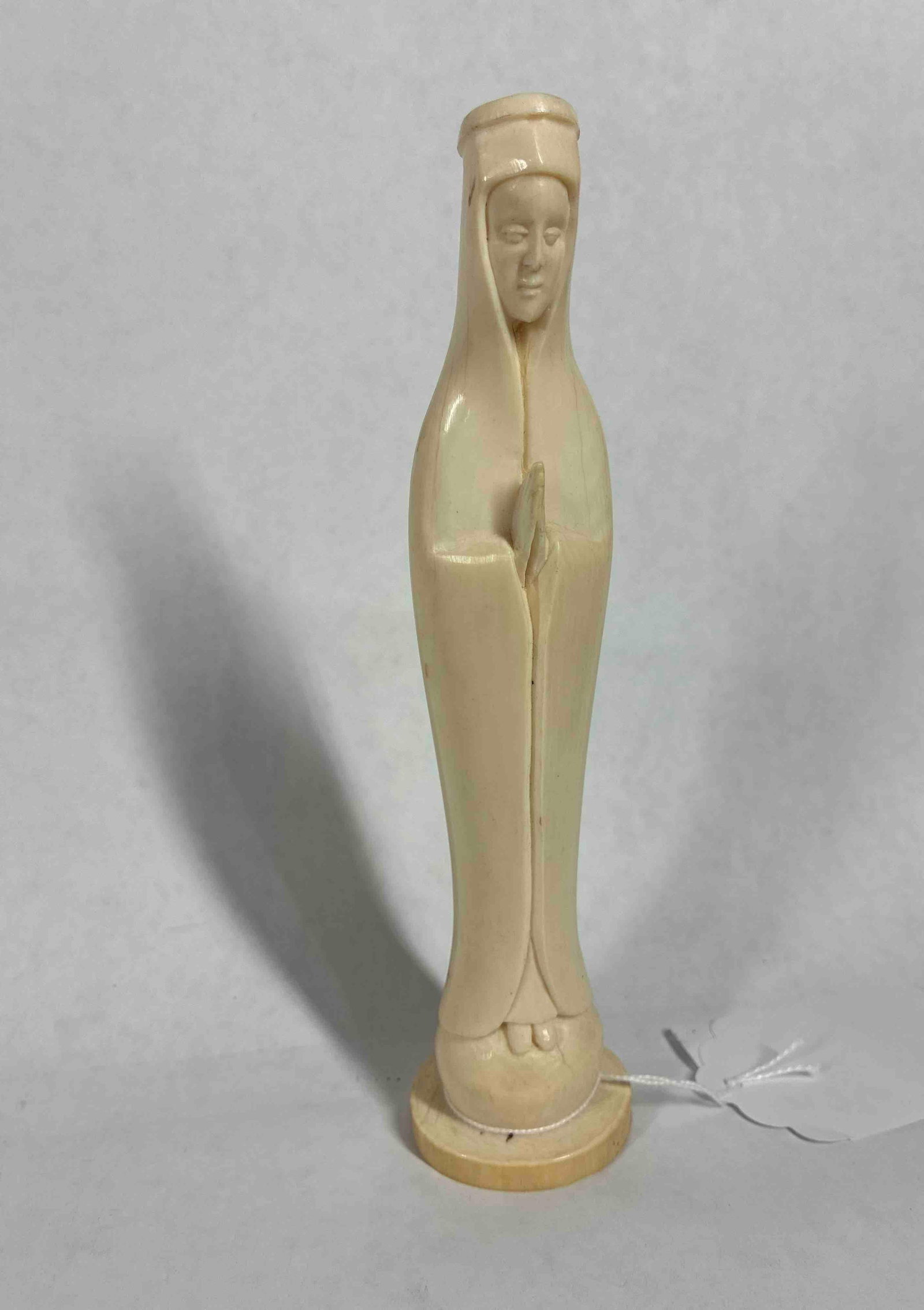 Mother Mary Natural Material Carved Figure: 7.25 inches tall.