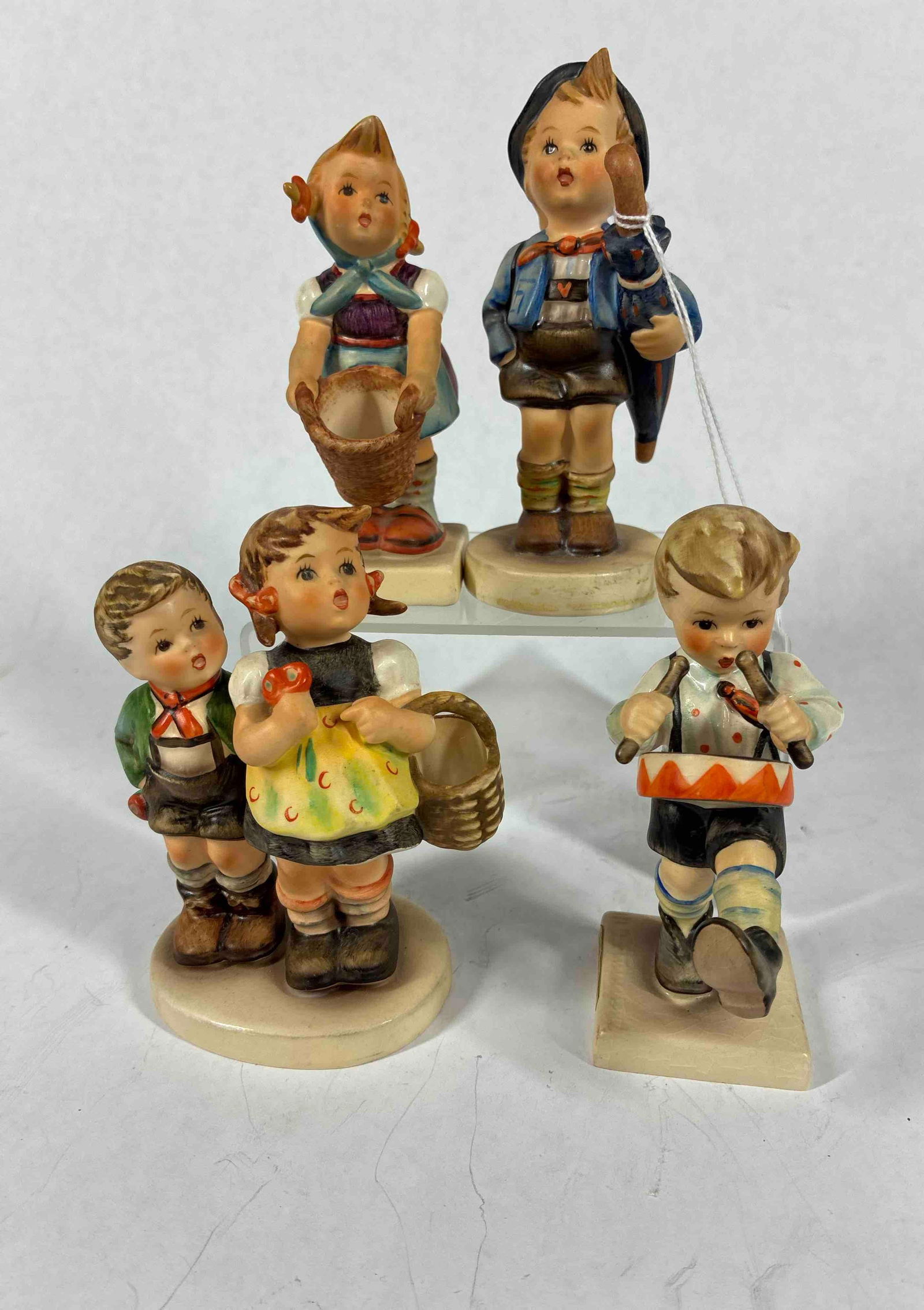 Goebel Hummels: To market 49 dated 1982, Little Drummer Little Helper, and Home From Market. All are approx 4 inches tall