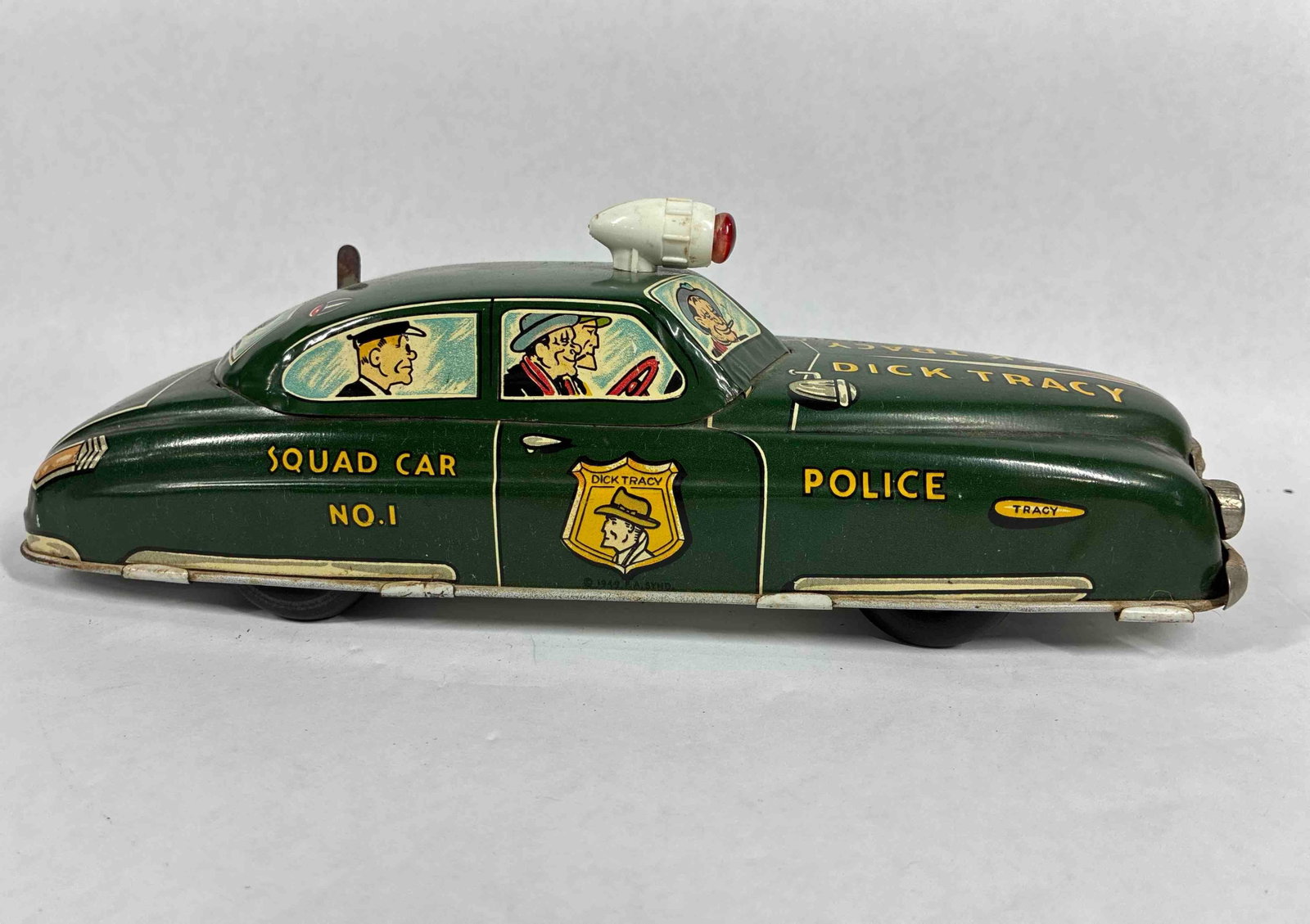 1949 Dick Tracy WInd Up Police Car: Key is missing, but graphics are great. 11 inches long