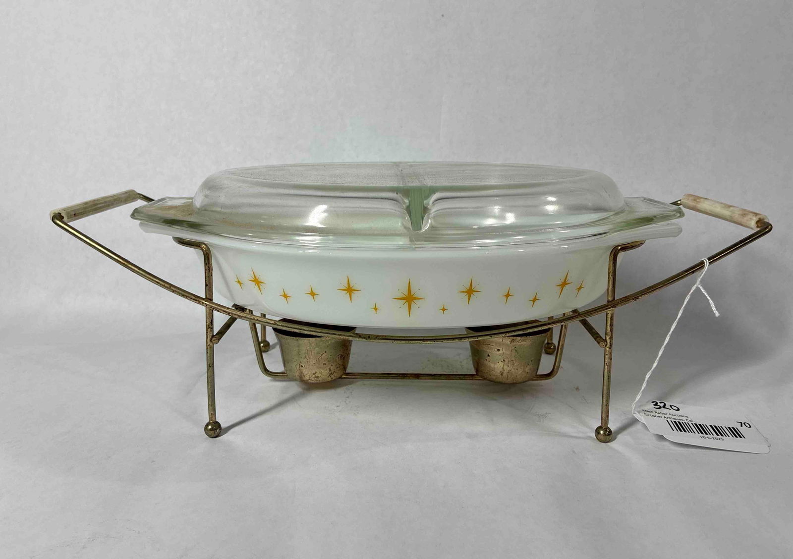 Pyrex Starburst Divided Casserole with Warming Stand: Glass lid included. Good condition