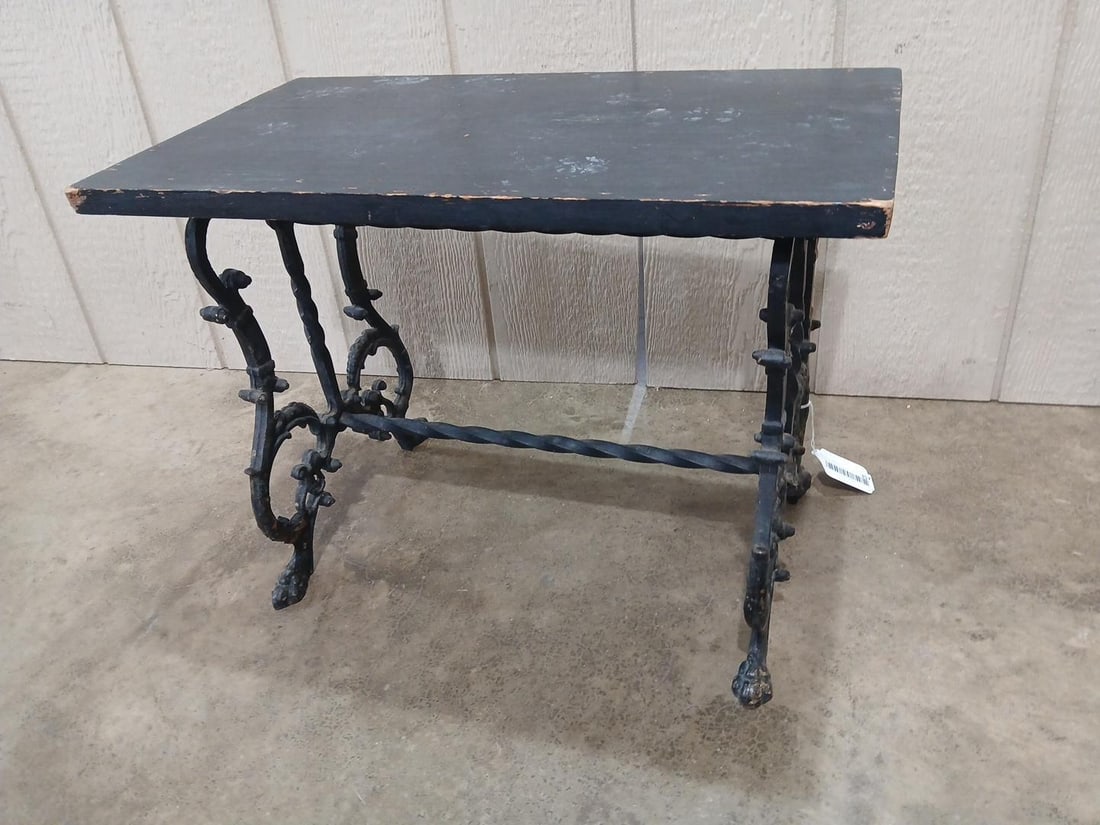 Wrought Iron Bench: Ornate iron legs with an added painted top. 22x12x16.5