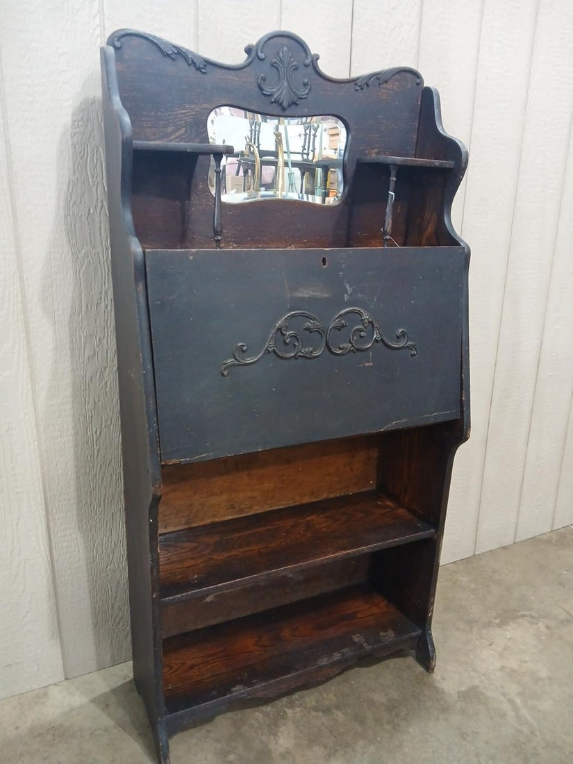 Drop Front Secretary Desk w Beveled Mirror: Candle shelves and sectioned cubbies on interior. Lower half features two shelves. 61x30.5x12