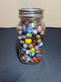 JAR OF CLAY AND GLASS MARBLES