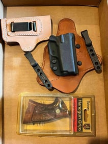 HANDGUN GRIPS AND HOLSTERS