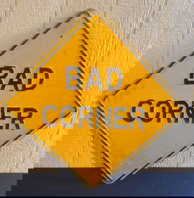 EMBOSSED BAD CORNER SIGN
