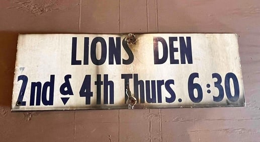 LIONS DEN PORCELAIN SIGN