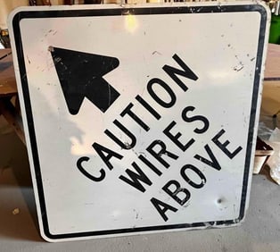 WIRES ABOVE ROAD SIGN