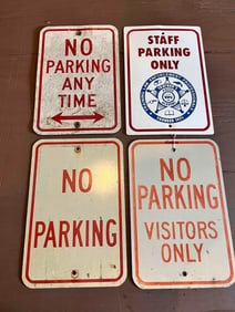 NO PARKING AND POLICE ACADAMY SIGNS