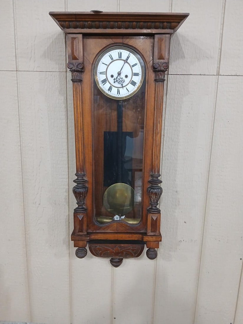 Carved Walnut & Oak Pendulum Wall Clock: Includes weights and pendulum. 41x14