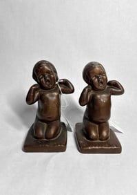 1920's M.L. Corp. NYC Yawning Child Door Stops / Book Ends