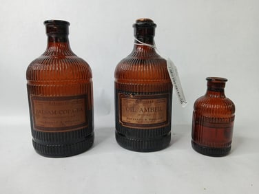Early Amber Glass Pharmacy/Druggist Apothecary Bottles by McKessons