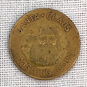 Christmas 1933 Halle Bros Co Enchanted Forest Santa Claus Brass Wishing Coin