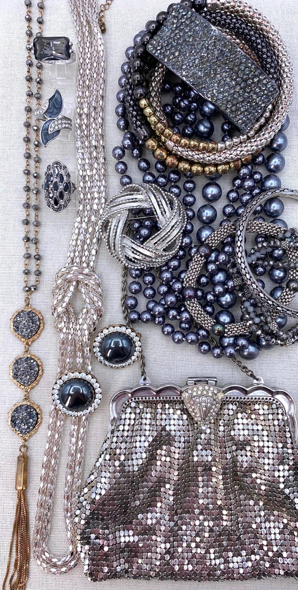 18 pc Whiting & Davis Chainmail Art Deco Handbag and Mysterious Gray Costume Jewelry Collection: Whiting & Davis stamping on the scalloped edge frame of the bag, working rhinestone studded closure, petite handle, peacock freshwater Pearls, faceted crystals, pewter faux pearls in LONG flapper leng