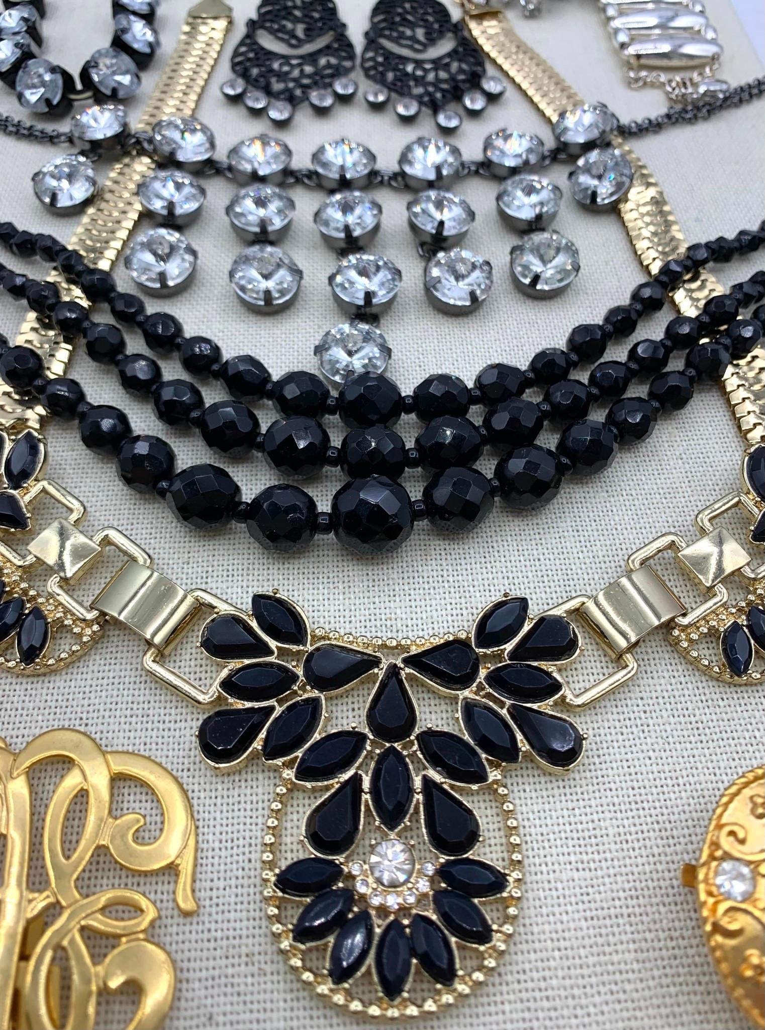 15 pc Mid Century to Vintage Witching Hour Black Magic Costume Jewelry Collection: Midnight black faceted glass, gilded metal and sparkling prong set rhinestones...pierced and clip earrings,ornate openwork shoe clips, radiant brooch/clip, choker, collar and draped adornments, all wi