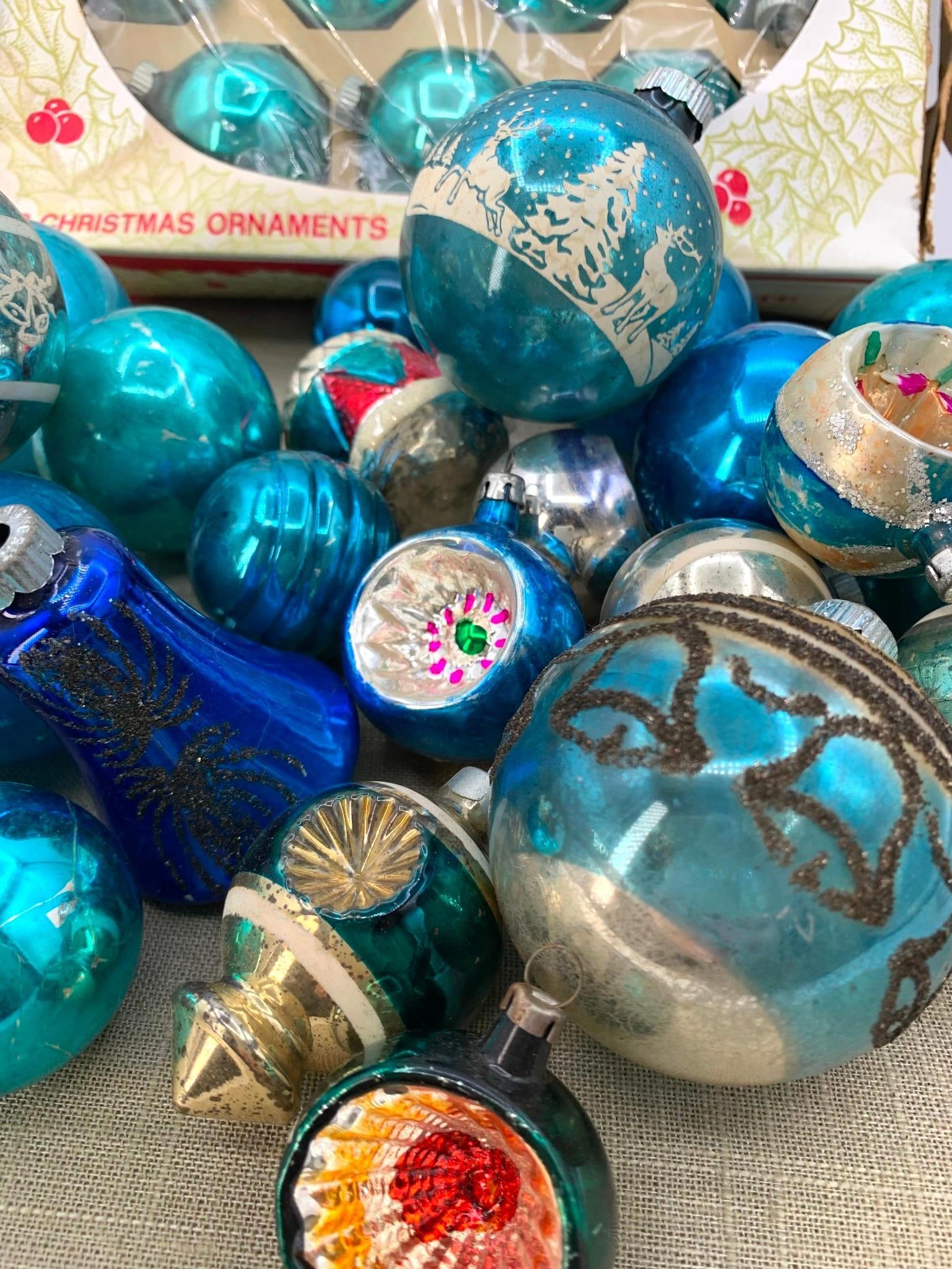 35 Vintage Poland, USA, Mercury Glass Christmas Tree Ornaments and Shiny Brite Box: Poland, USA, Shiny Brite embossed caps, one early Shiny brite paperboard box, indent, glitter and striped detailing. Age and wear to the box, the glass ornaments are structurally sound with some color