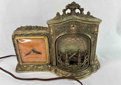 United Clock Co. Simulated Flickering Fire Place Clock