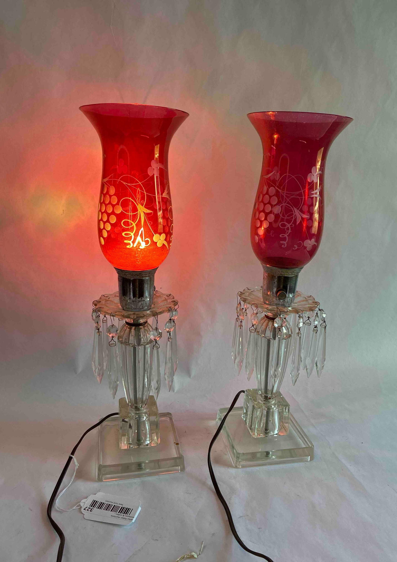 1030s Etched Cranberry Glass Hurricane Table Lamps: Each with glass prisms and glass base. 18 inches tall both work