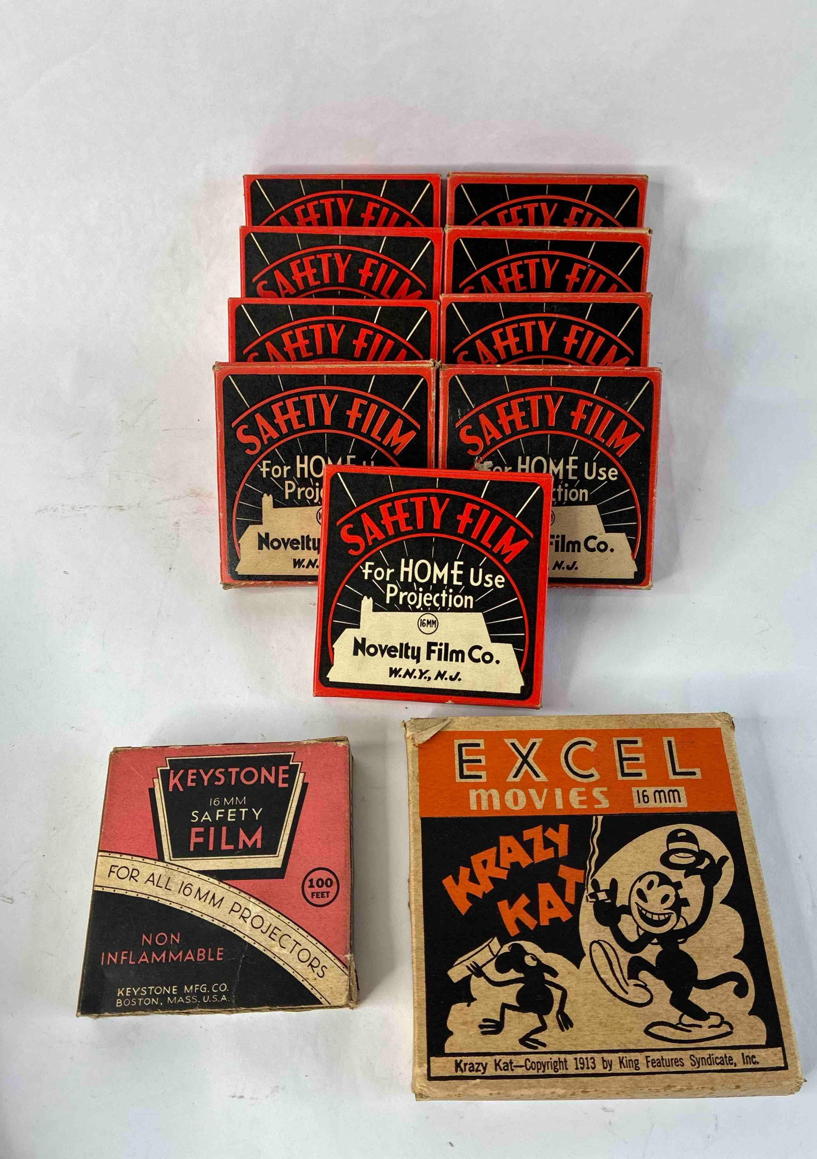 1950s & 60's 16mm Home Projection Films Inc. Charlie Chaplin, Mickey McGuire, Rex Bell and More: This lot includes Krazy Kat, Simon the Monk, Rex Bell, Buzz Barton, Jack Perrin, Charlie Chaplin, Multiple Mickey McGuire and One Unmarked all are in origianal packaging 