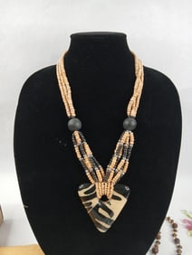 Assorted lot of jewelry, beads, pearls, bible and more